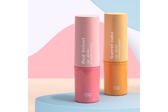 Image Two samples of Quadpack's new recycled PET-based lipstick packaging, branded Emerald Lipstick.